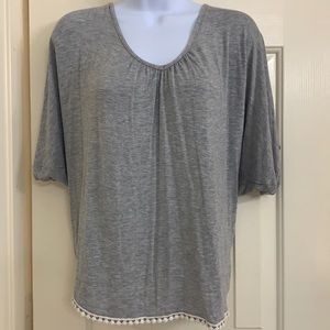 Cute ladies top, super soft with cute trim on bottom.